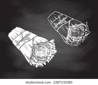 Hand-drawn sketch style burrito wrap with vegetables  pieces in paper package   isolated on chalkboard background. Fast food illustration. Vintage drawing. Element for the design of labels, packaging 