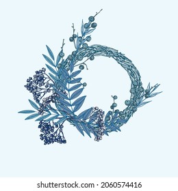 Hand-drawn sketch winter wreath with rowan berries, branches, leaves in engraving style. Vintage floristic door wreath. Christmas retro decor Wedding graphic frame Hello, fall. Vector illustration.