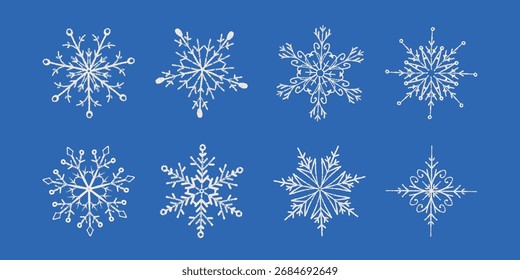 Hand-Drawn Snowflake Collection in Winter Doodle Style. White decorative snow crystals on a blue background, perfect for Christmas cards, holiday invitations, seasonal posters, gift tags, scrapbooking