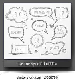 Hand-drawn speech and thought bubbles isolated on white. Vector sketch illustration.