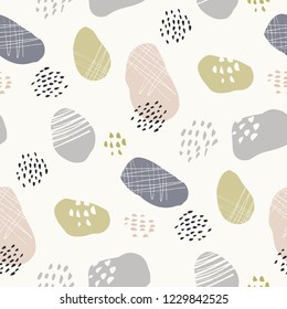 Hand-drawn stone-like textured organic fragments vector seamless pattern. Whimsical abstract geo.