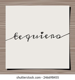 Hand-drawn style typographic design for Valentine's Day. Paper note on wood background mock-up. Te quiero - I love you in Spanish.