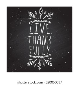 Handdrawn thanksgiving label with feathers and text on chalkboard background. Live thankfully.