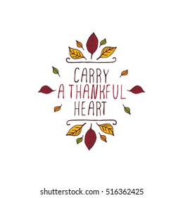 Handdrawn thanksgiving label with leaves and text on white background. Carry a thankful heart.