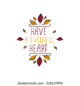 Handdrawn thanksgiving label with leaves and text on white background. Have a thankful heart.