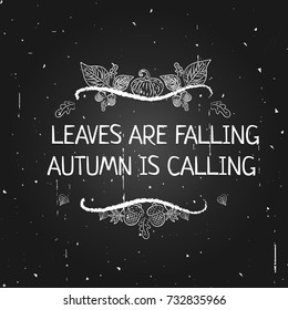 Handdrawn typographic element with acorns, leaves and text on blackboard background. Leaves are falling, autumn is calling