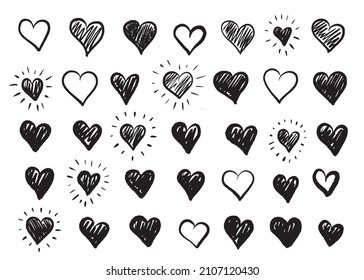 Hand-drawn vector black heart shapes set.	