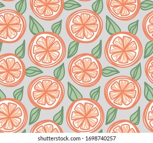 Hand-drawn vector grapefruits on gray background. Seamless pattern.