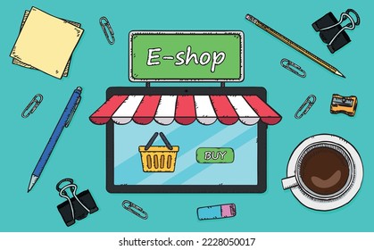 Hand-drawn vector graphics showing an online store shown on a tablet screen with a shopping cart and a buy button. Tablet is laying on office desk surrounded by office supplies