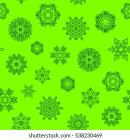 Hand-drawn vector illustration of isolated stylized snowflakes. Beautiful decoration. Symbol of winter. Isolated watercolor snowflakes on green background.