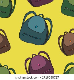 hand-drawn vector seamless pattern, colored school bags on a yellow background