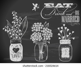 hand-drawn wedding invitation with flowers on chalkboard