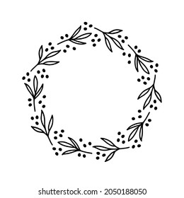 Hand-drawn wreath with dots. Black plant doodle wreath for Christmas decoration.