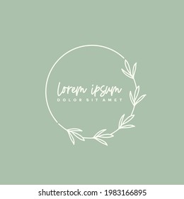 Hand-drawn wreath logo. Botanical label for packaging. Herbal wreath emblem wedding design.