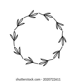 Una corona de flores dibujada a mano sobre fondo blanco. La corona de doodle de la planta negra.