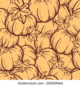 Hand-drown vector pumpkin and leaves seamless pattern.