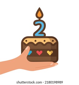 Hand-holding birthday cake with candle number two. 2-year-old. Vector illustration.