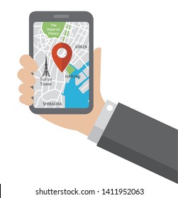 Hand-holding mobile phone with map application ( Tokyo city ) flat illustration