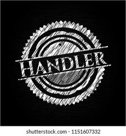 Handler chalk emblem written on a blackboard