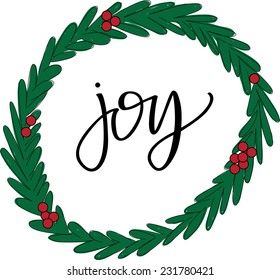 Hand-lettered 'Joy' inside a Christmas wreath