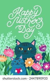 A hand-lettered Mother's Day holiday card. A mother cat and a kitten are standing in a flower meadow and holding a heart in their paws