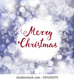 Hand-lettering Merry Christmas on a Christmas decoration background
