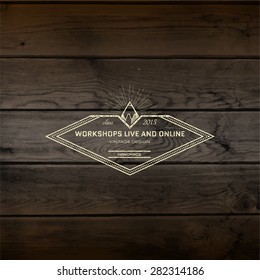 Handmade badges logos and labels for any use, on wooden background texture