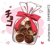 Handmade chocolate balls in plastic bag. Translation: Chocolate in Japanese