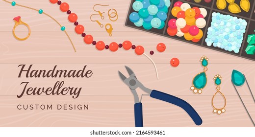 Handmade custom jewels: hobby and crafts supplies on a wooden desk