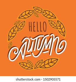 Handmade inscription Hello Autumn in a wreath of fallen leaves.Vector illustration. Isolated on orange background.