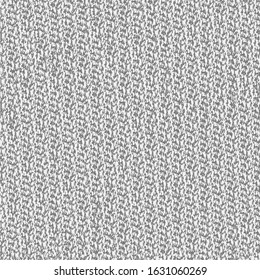 Handmade knitted wool. Rough sweater or jersey texture. Gray textured background.