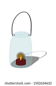 Handmade lamp from a candle in a jar for Halloween. Isolated on a white background.