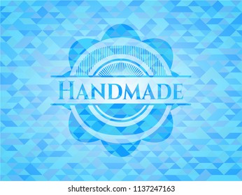 Handmade light blue emblem with triangle mosaic background