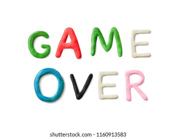 Handmade modeling clay words game over. Realistic 3d vector lettering isolated on white background. Children cartoon style.