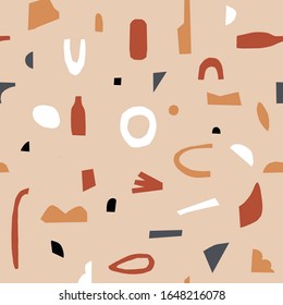 Handmade tan beige geometric abstract shapes. Seamless orange gold black white beige pattern. Stylish repeating texture. Modern. Simple. Cut paper. Trendy.
