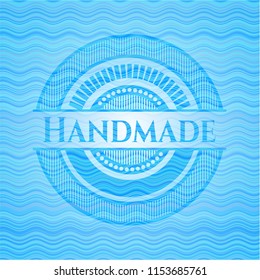 Handmade water wave emblem.