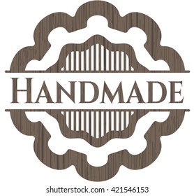Emblema de madera artesanal