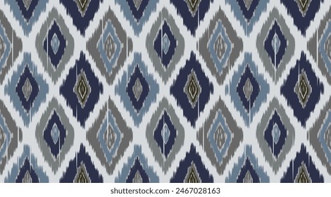 Hand-paingted Ikat style diamond-shaped seamless pattern in indigo blue, gray and denim blue on light blue background. A multipurpose for fabric, wallpaper and other printings.