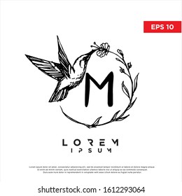 handrawn initial letter m hummingbird logo. vintage icon, template design