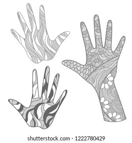 Hands with abstract colored patterns on isolation background. Design for spiritual relaxation for adults. Zen art. Doodles for banners, posters, t-shirts and textiles