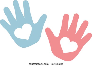 Hands of baby blue and pink with hearts