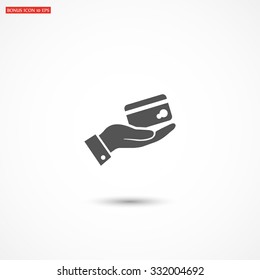 in the hands of the Bank credit card icon, vector . 10 EPS