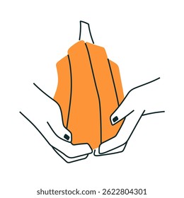 Hands with bright orange pumpkin. Autumn harvest