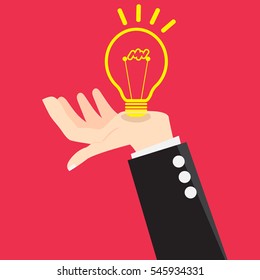 Hands of a businessman with a light bulb idea