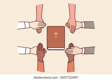 Hands of christians believers held bible, which allows them to commune with lord and learn prayers or gospel. Christians feel unity and cohesion through common faith and opportunity to go to church