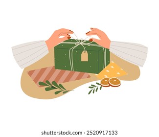 Hands in cozy sweater holding christmas gift with red bow vector isolated illustration. Stylish female opening or wrapping present with red ribbon. Preparing gift for Christmas, new year souvenirs.
