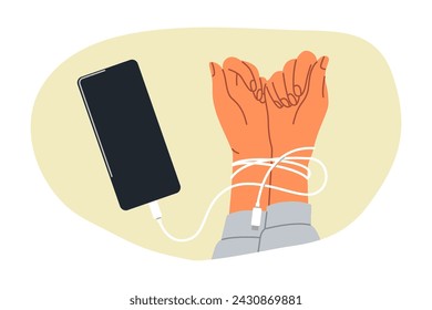 Hands digital hostage are tied with headphones from mobile phone, and symbolize dependence on social networks. Person has become digital hostage due to uncontrolled visits to websites and applications