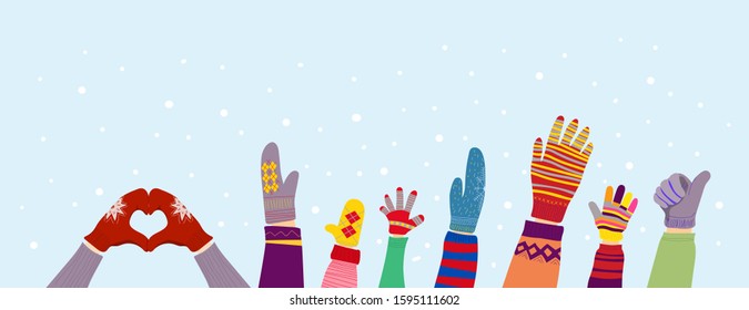  Hands dressed in gloves against the blue sky.Hands in mittens in winter.Vector illustration.