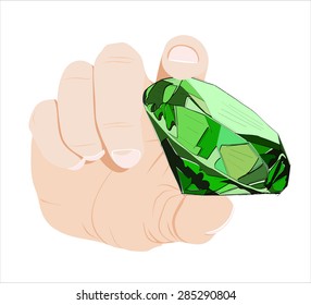 hands with emerald.