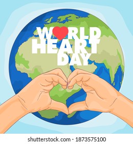 Hands forming a heart with the world in the background to raise awareness about international heart day